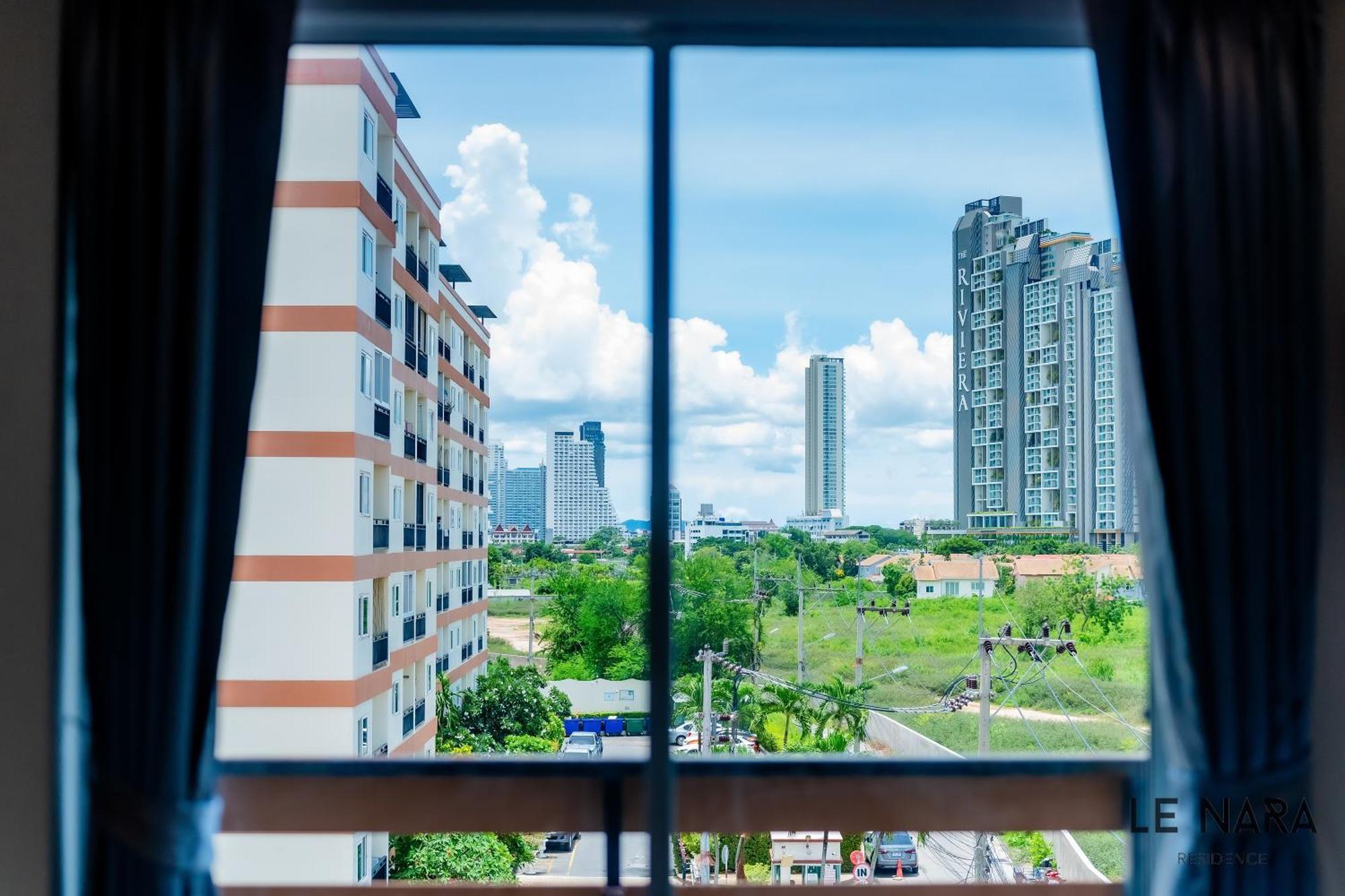 Le Nara Residence Praia de Jomtien Exterior foto